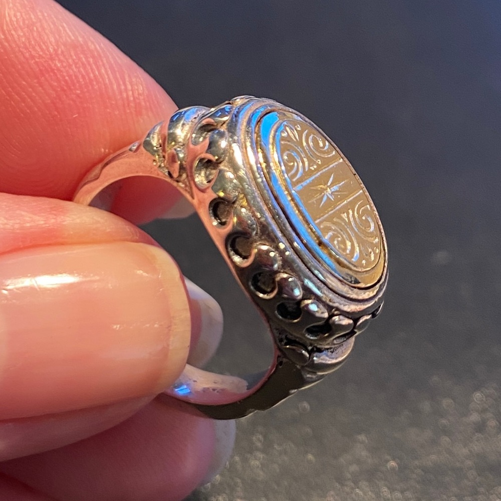 Sterling and gold ring with Konstantino bag